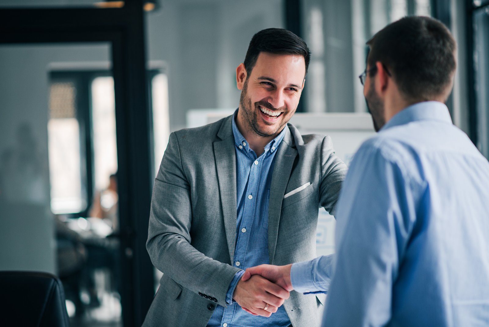 Sales professional reviewing site photos